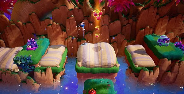 Wer in "Die Schlümpfe – Abenteuer im Traumland" bestehen will, muss mit seinem Schlumpf fleißig hüpfen, Beeren sammeln und Gegner besiegen. - © Microids