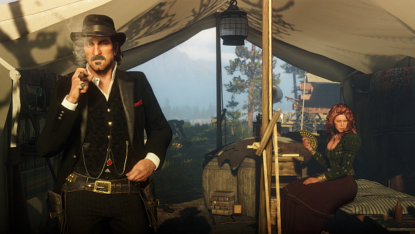 Dutch van der Linde mit Molly O'Shea, die zum "Arbeiten" in jede neue Stadt geschickt wird, die die Gang ansteuert. - © Rockstar Games