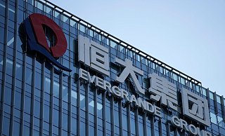 Der Konzern China Evergrande ist umgerechnet mit mehr als 300 Milliarden US-Dollar der weltweit am höchsten verschuldete Bauträger. - Ng Han Guan/AP/dpa