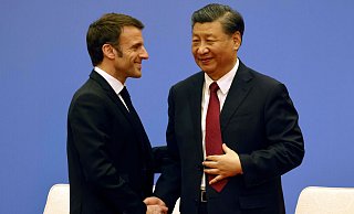 Frankreichs Präsident Emmanuel Macron trifft seinen chinesischen Amtskollegen Xi Jinping in Peking. - Ludovic Marin/AFP Pool/AP/dpa