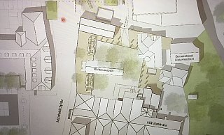 Die Ansicht zeigt das gesamte Ensemble mit dem Rathaus (links), der Münsterkirche (unten), dem neuen kompakten Gebäude und seinem Anbau (oben) und den Gebäuden der Evangelischen Kirche mit Gemeindesaal und Diakoniestation (rechts oben). Zwischen dem neuen Kompaktbau und der Münsterkirche liegt die Wolderuskapelle, die an beide Gebäude mit einem angedeuteten Kreuzgang verbunden wird. - Architekturbüros Pfeiffer, Ellermann, Preckel