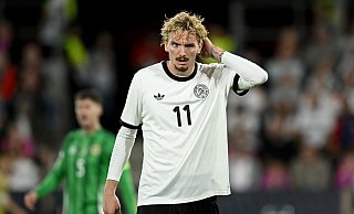 Nick Woltemade stößt mit Verspätung zum Nationalteam. (Archivfoto) - Marius Becker/dpa