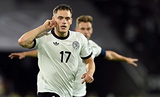 Florian Wirtz jubelt über sein Tor gegen Nordirland (Archivbild). - Federico Gambarini/dpa