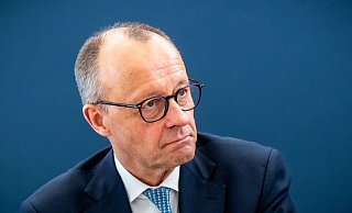 Friedrich Merz will die deutsche Olympia-Bewerbung unterstützen – stellt aber klare Forderungen an Politik und Sport. - Michael Kappeler/dpa