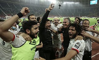 Ägyptische Spieler feiern nach dem Abpfiff. - Foto: Ayman Aref/dpa