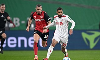 Beide Teams boten sich einen harten Pokal-Kampf. - Federico Gambarini/dpa