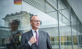 Kanzlerkandidat Merz will nach einem Wahlsieg einen Wechsel in der Asyl- und Einwanderungspolitik. - Michael Kappeler/dpa