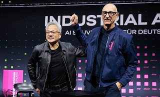 Nvidia und die Deutsche Telekom kooperieren bei einer KI-Fabrik in München. - Carsten Koall/dpa