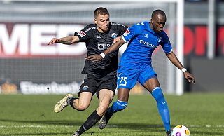 SCP-Akteur Filip Bilbija (l.) dürfte es an diesem Samstag unter anderem wieder mit dem Magdeburger Silas Gnaka zu tun bekommen. - picture alliance/dpa