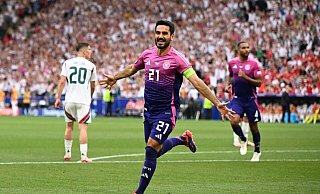 DFB-Kapitän Ilkay Gündogan jubelt nach seinem Tor zum 2:0 gegen Ungarn. - Federico Gambarini/dpa