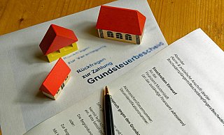 Die Stadt wird einen differenzierten Hebesatz für die Grundsteuer B (bebaute und unbebaute Wohngrundstücke sowie Gewerbegebäude) einführen. - picture alliance / CHROMORANGE