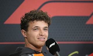 Eine Aktion mit anschließender Strafe für Red Bull amüsierte Lando Norris. - Then Chih Wey/Xinhua/dpa