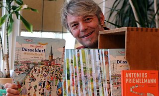 Mit seinen Wimmelbüchern hat Roland Siekmann sich einen Namen gemacht. Düsseldorf ist gerade zusammen mit Essen erschienen. - Wolfgang Rudolf