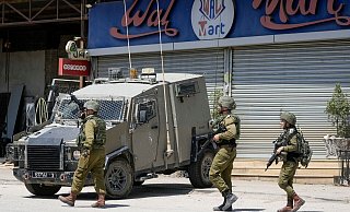 Israelische Militäroffiziere im Einsatz. - Majdi Mohammed/AP/dpa