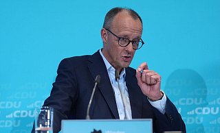 Die CDU justiert ihre zentralen Themen im Wahlkampf: Wirtschaft und innere Sicherheit. Auf eine mögliche Politikwende in den USA blickt der Kanzlerkandidat gelassen. Ziehen die Umfragewerte jetzt an? - Marcus Brandt/dpa