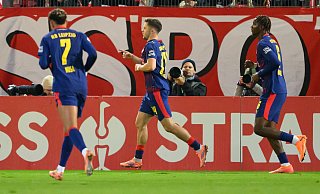 Christoph Baumgartner (RB Leipzig, M) jubelt nach seinem Tor zum 0:2. - Robert Michael/dpa