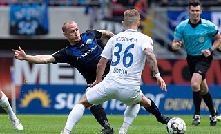 Eine Neuauflage dieses Duells wird es am Sonntag nicht geben: SCP-Stürmer Sven Michel (l.) ist verletzt. Der Heidenheimer Niklas Dorsch kickt unterdessen nun für den belgischen Vizemeister KAA Gent. - picture alliance/dpa