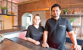 Sabrina und Muhammad Usman wagen in einer Borgholzhausener Pizzaria einen Neuanfang. - Andre Schneider
