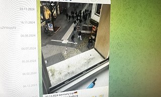 Ein Video auf einem internationalen Ultra-Portal des Messengers Telegram zeigt, wie etwa 25 schwarz gekleidete Männer aus der Karl-Eilers-Straße loslaufen und in die Friedenstraße abbiegen. - Screenshot: Telegram