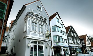 Sieben Wohnungen gibt es an der Kirchstraße 7 in Gütersloh. In den Geschäftsräumen im Erdgeschoss war zuletzt die Sushi-Bar Ohayo. In Kürze wird der Pizza-Lieferdienst "Pizza Pax" einziehen. - Andreas Frücht
