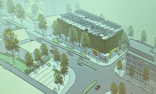 Das Parkhaus, hier vom Dach der Arbeitsagentur aus gesehen, soll zwischen der Lübberbruch-Turnhalle (l.) und dem Ärztehaus entstehen. - Stadt Herford