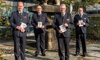 VdF-Kreisgeschäftsführer Hubert Halsband (v. l.), Vize-Kreisbrandmeister Andreas Müller, Vorsitzender und Kreisbrandmeister Elmar Keuter und sein Stellvertreter Christoph Müller laden zum Verbandstag am Samstag, 28. Mai, nach Delbrück-Boke ein. - VdF/ Ralph Meyer