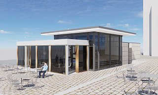 Der Blick von Marktstraße und oberem Marktplatz: Die Erweiterung ragt aus dem Altbau heraus. Tische und Stühle stehen auf der Freifläche. - Bierhoff und Bierhoff