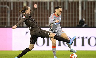 SCP-Akteur Julian Justvan wird es am Samstag unter anderem wieder mit St. Paulis "Kilometerfresser" Jackson Irvine (l.) zu tun bekommen. - Imago Images