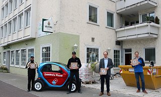 Dominos-Betriebsleiter Matteo Napolitano (v.l.), Standortleiter Matthias Struck, Heiner Buitkamp von der Wirtschaftsförderung Paderborn und Citymanager Heiko Appelbaum haben sich vor Ort über den Umbau-Fortschritt im Libori-Eck informiert. - Werbegemeinschaft