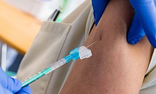 Eine mögliche Impfpflicht steht derzeit in der Diskussion. - AFP