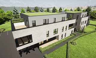 In der Computer-Visualisierung sieht es aus, als sei das geplante 14-Parteien-Wohnhaus von einer Parklandschft umgeben. In der Realität kann der Blick in den Garten sechs Meter weit schweifen - dann kommt die Wand des Netto-Marktes. - Bauteam Lang