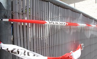 Der Zugang zum Garten war von der Polizei mit Flatterband abgesperrt worden. - Burkhard Battran