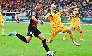 Dresdens Innenverteidiger Tobias Kraulich (r.) steht auf dem Zettel von Arminia Bielefeld. - IMAGO/Zink