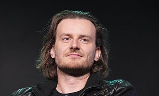 Bitpanda-Mitbegründer Eric Demuth zieht sich aus dem Tagesgeschäft zurück und kümmert sich im Verwaltungsrat von Bitpanda um die strategische Ausrichtung des Unternehmens. (Archivbild) - Marcus Brandt/dpa