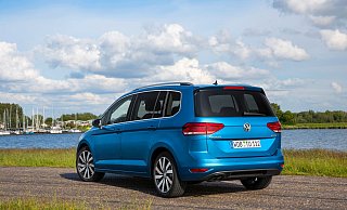 Für Arbeit, Sport und Spiel: Vielseitige Vans wie der VW Touran stehen oft auch bei Familien hoch im Kurs - wie stehen seine Aktien als Gebrauchter? - Volkswagen AG/dpa-tmn