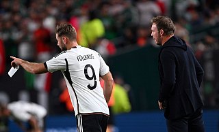 Für Bundestrainer Julian Nagelsmann (r) ist Füllkrug ist auch eine Fix-Größe für die kommenden Länderspiele. - Federico Gambarini/dpa