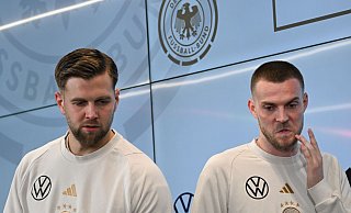 Die Nationalspieler Niclas Füllkrug (l) und Marvin Ducksch sind wieder vereint. - Arne Dedert/dpa