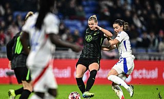 Alexandra Popp verliert mit Wolfsburg unglücklich in Lyon. - Jeff Pachoud/AFP/dpa