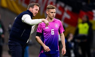 Geht es nach Andreas Möller, sollte Bundestrainer Julian Nagelsmann (links) Kapitän Joshua Kimmich wieder im Mittelfeld aufstellen. - Tom Weller/dpa