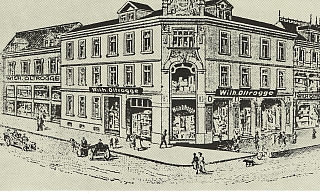 Das Geschäftshaus in der Niedernstraße 41 um 1870. 1866 wurde es als Eisenwarengeschäft von Wilhelm Oltrogge gegründet.   - Oltrogge GmbH & Co. KG