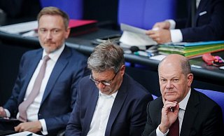 Christian Lindner, Robert Habeck und Bundeskanzler Olaf Scholz im Bundestag. - Kay Nietfeld/dpa