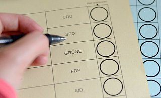 Über die Posten des Landrats und der Bürgermeister sowie die dazugehörigen Ratsmandate wird am Sonntag abgestimmt. - Lena Henning