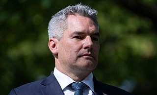 Trotz Krise: Österreichs Kanzler Karl Nehammer will die Regierungszusammenarbeit mit den Grünen weiterführen. - Sven Hoppe/dpa