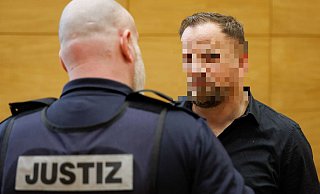 Berat Nimani, Bruder des erschossenen Profiboxers Besar Nimani wird wegen versuchten Mordes angeklagt. - Friso Gentsch/dpa Berat Nimani, Bruder des erschossenen Profiboxers Besar Nimani wird wegen versuchten Mordes angeklagt. - Friso Gentsch/dpa