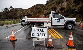 Augenzeugen berichteten nach dem Wintersturm von umgestürzten Bäumen, überschwemmten Straßen und kleineren Erdlöchern. - Ethan Swope/FR171736 AP/AP/dpa