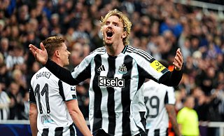 Nick Woltemade feiert mit Newcastle United den Sieg gegen Benfica Lissabon - Mike Egerton/PA Wire/dpa