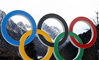 Die nächsten Winterspiele finden in Norditalien statt. Ab sofort gibt es Tickets. - Alessandro Trovati/AP/dpa
