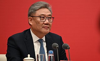 Chinas Handelsminister Wang berief sich auch auf Aussagen Staatschef Xi Jinping. - Johannes Neudecker/dpa