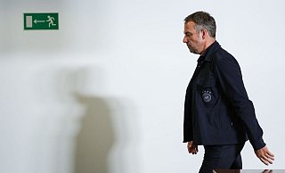 Hansi Flick hat auch nach dem 0:1 gegen Polen nicht an Zuversicht für die Heim-EM eingebüßt. - Christian Charisius/dpa