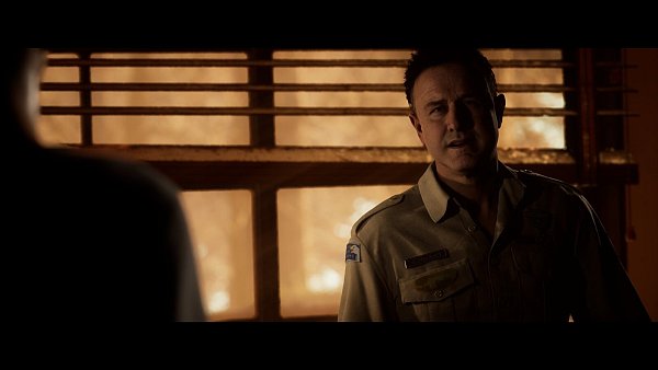 Chris (gespielt von David Arquette) ist der freundliche Besitzer, Betreiber und die gute Seele von Hackett’s Quarry. Aber auch er hat Geheimnisse. - © 2K / Supermassive Games